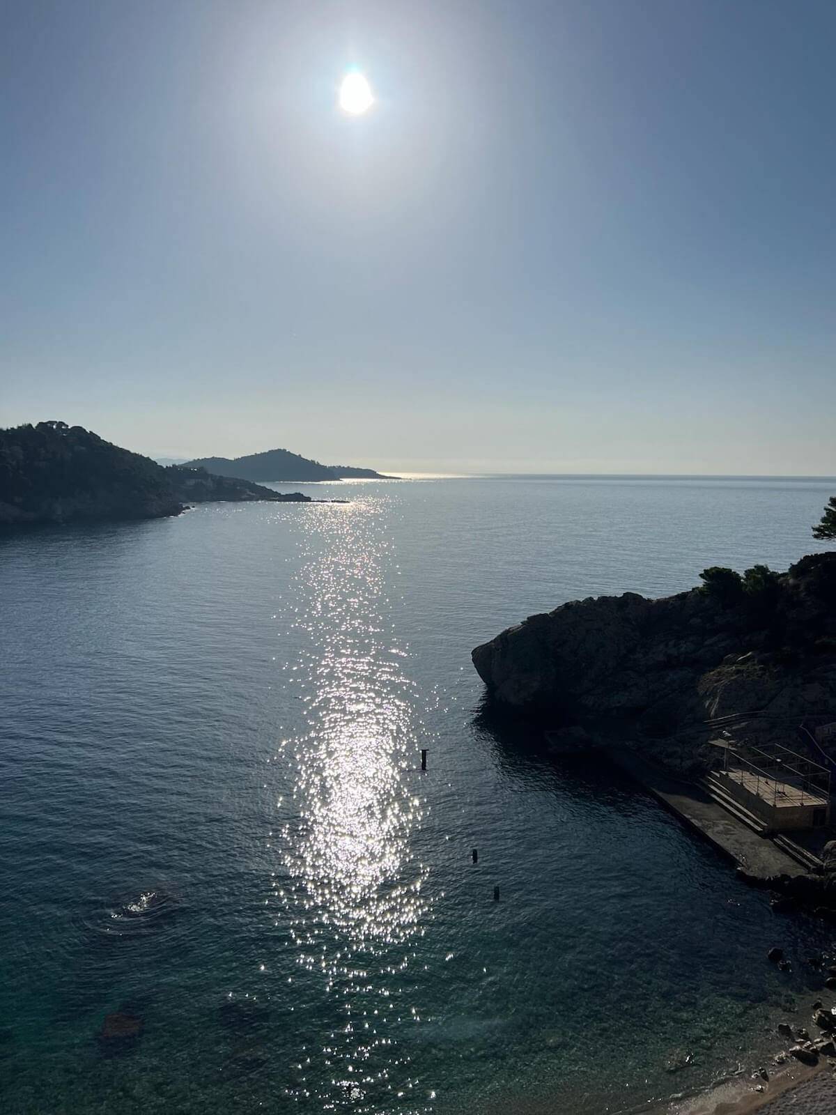 Sunlight glistens on the ocean's surface