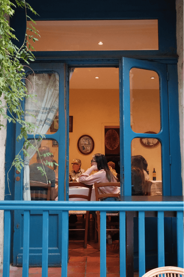 A rustic wooden fence made of vertical planks