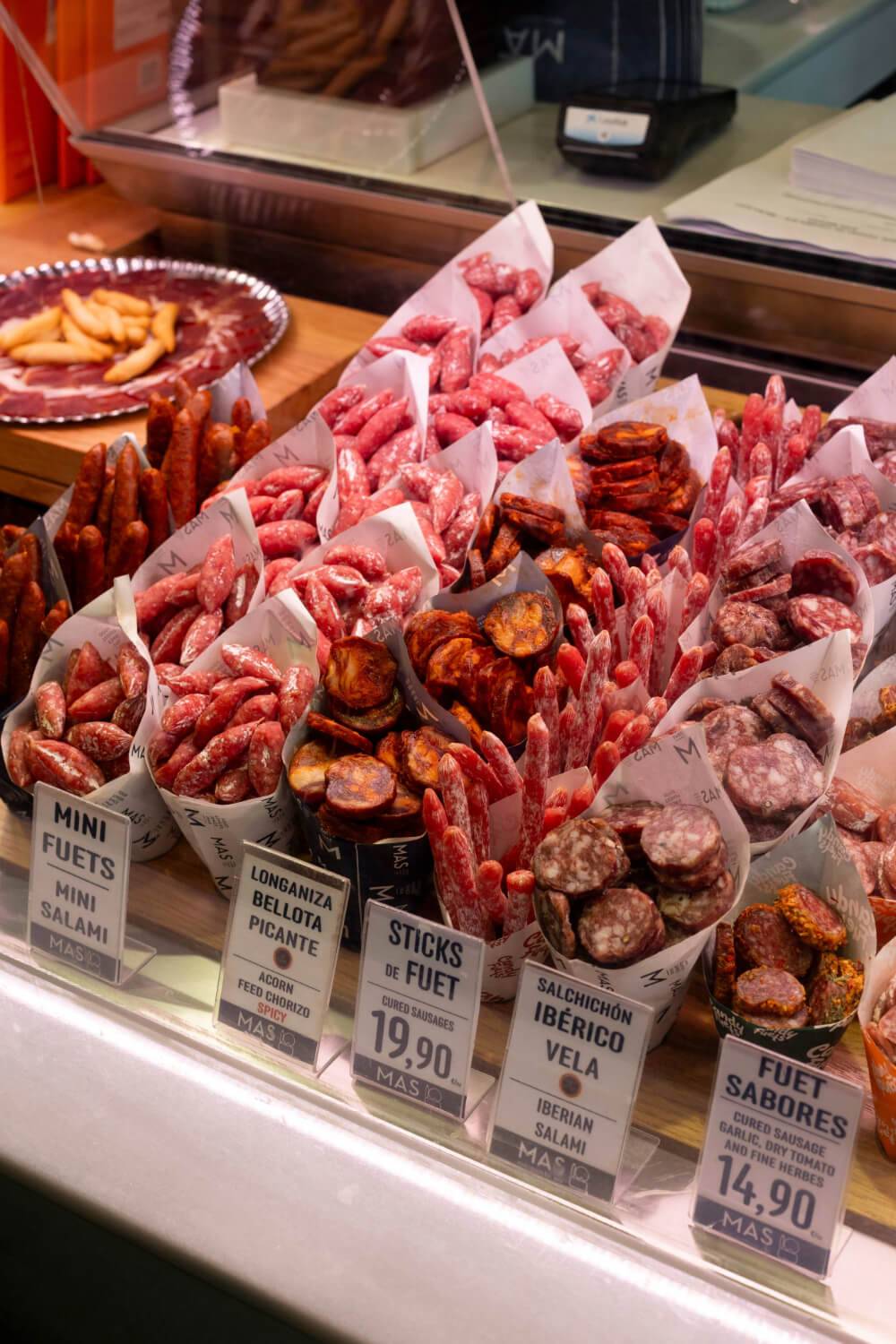 A display case showcasing various cuts of meat