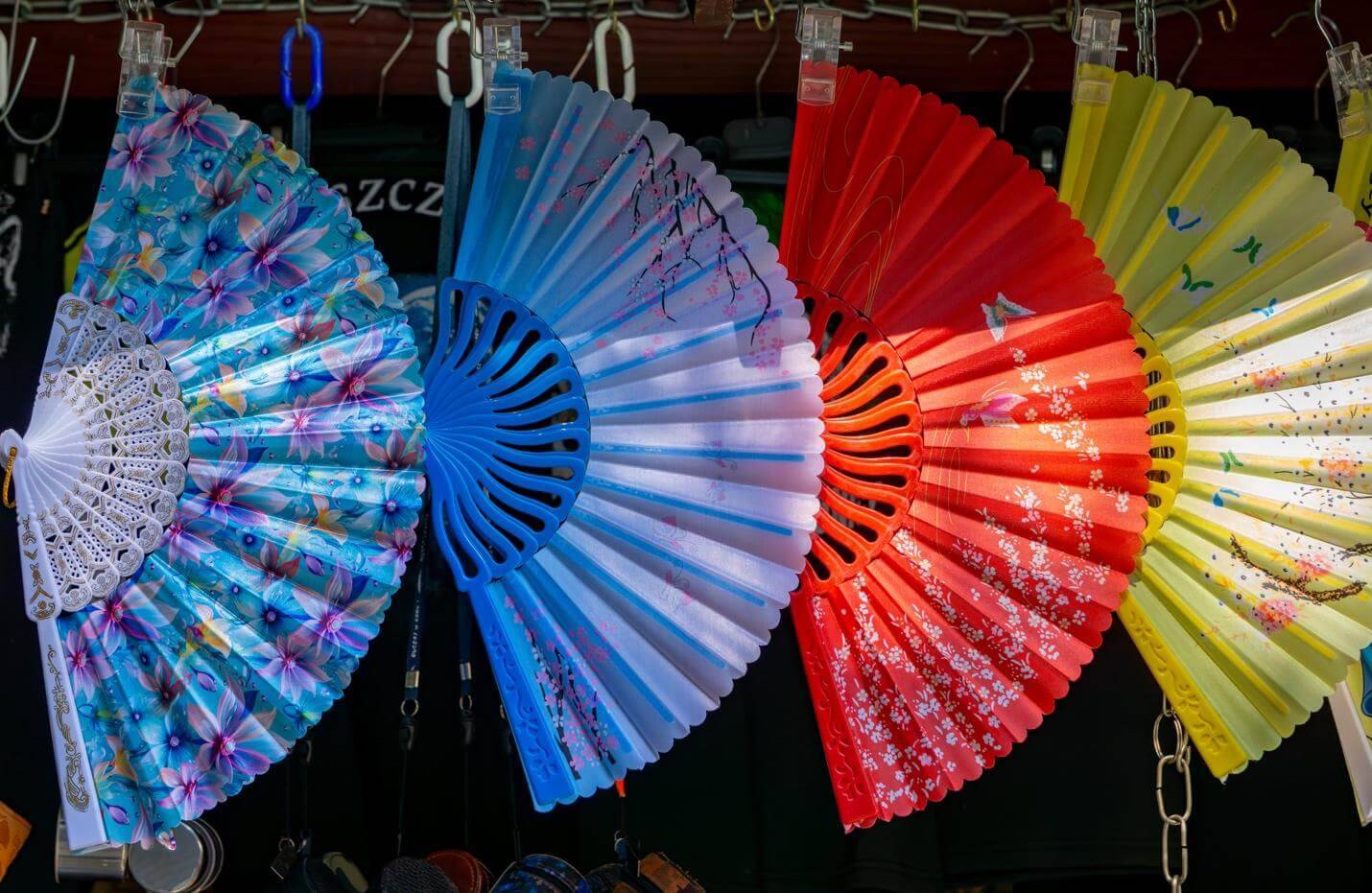 A row of vibrant, colorful fans