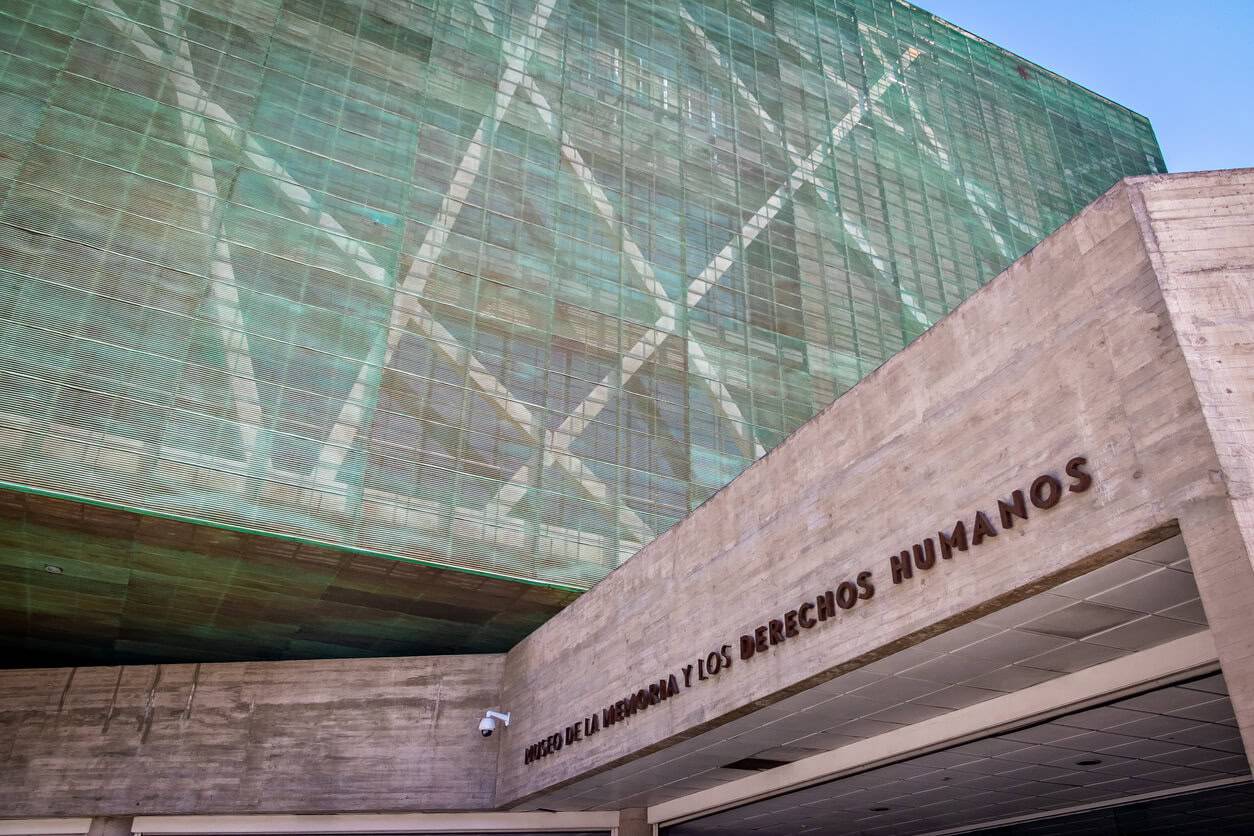 A building characterized by its green and brown facade
