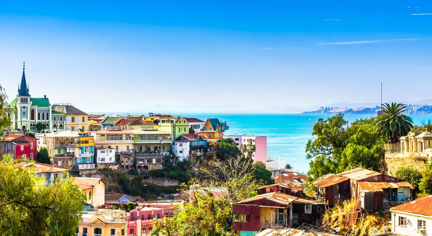 A row of colorful houses perched on a hillside